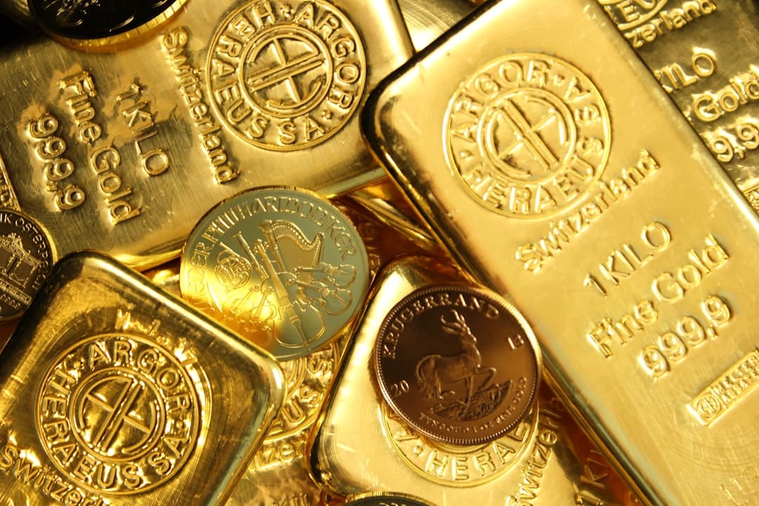 Pile of gold bullion coins and bars. Argor Heraeus, Münze Österreich and Krugerrand. If you use our photos, please add credit to https://zlataky.cz, when possible